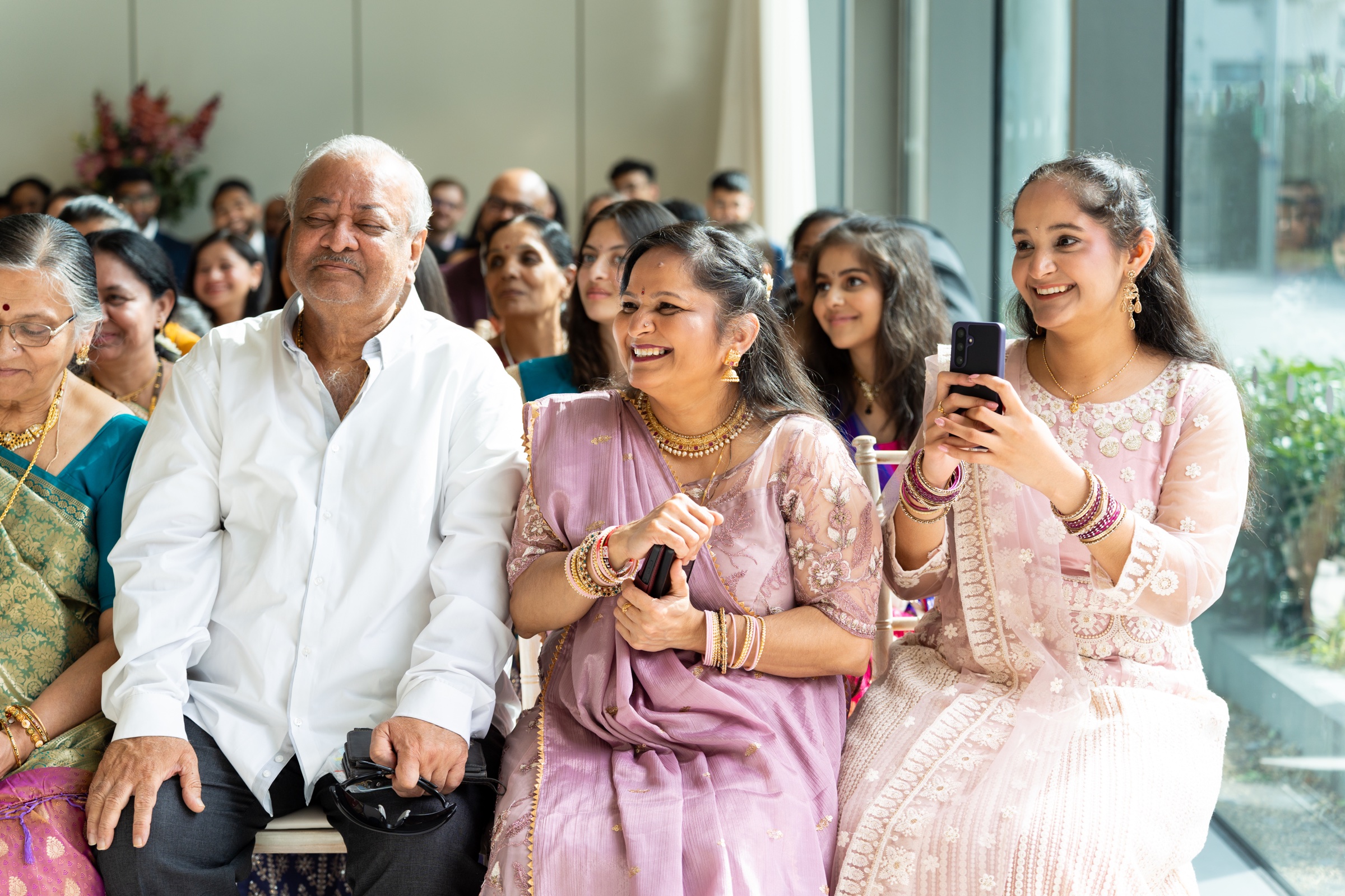 Three generations of a family sharing a joyful moment