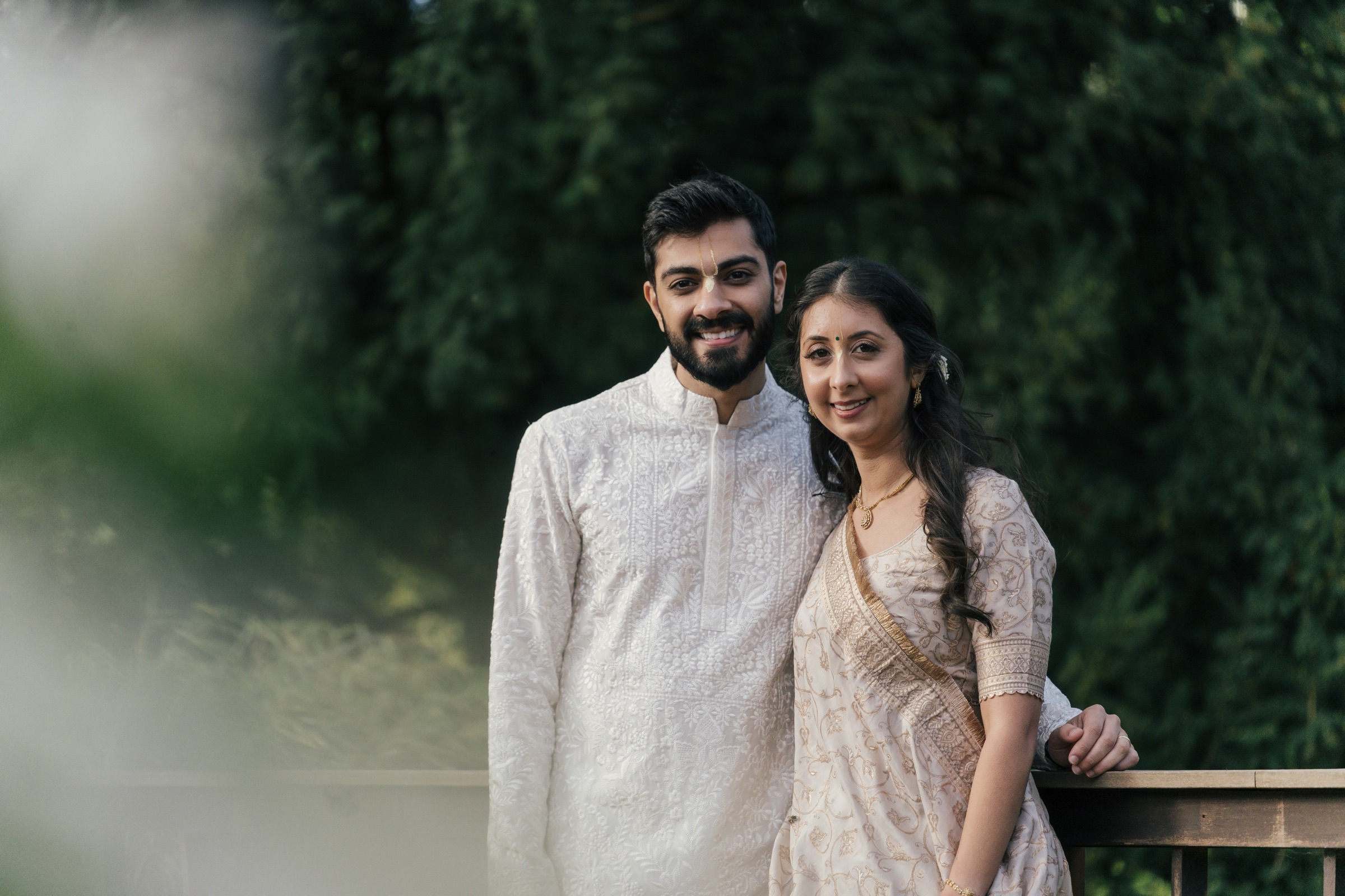 A couple standing together in a garden